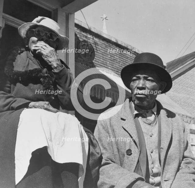Old friends sitting on the front porch, Daytona Beach, Florida, 1943. Creator: Gordon Parks.