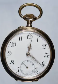 Old gold watch. Creator: Unknown