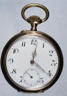 Old gold watch. Creator: Unknown
