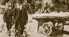 Old Jewish man and his grandson carrying some fowls, Wentworth Street, Stepney, 20th century. Creator: Unknown