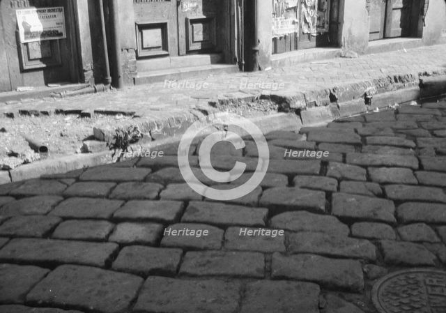 Old pavement blocks, New Orleans, between 1920 and 1926. Creator: Arnold Genthe.