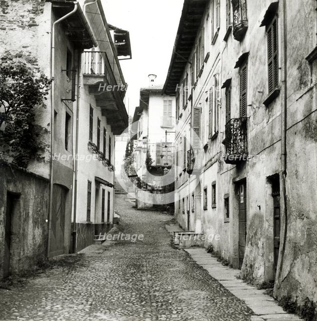 Old street in Orta San Giulio, Lake Orta, Italy, c1955.  Creator: Arthur Charles Kirby Ware.
