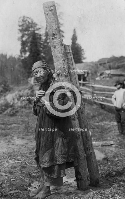 Old Shoria Woman Collecting Wood; The Kumys Ulus, 1913. Creator: GI Ivanov.