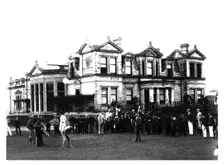 Old Tom Morris outside the Old Course Clubhouse at St Andrews in Scotland, c1900