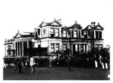 Old Tom Morris outside the Old Course Clubhouse at St Andrews in Scotland, c1900