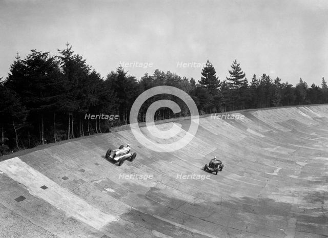 Oliver Bertram's Barnato-Hassan and GA Wooding's Talbot 95 Special, Brooklands, 1938. Artist: Bill Brunell.