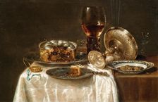 Olives in a blue and white porcelain bowl, a roemer, wine glasses, an overturned silver..., 1650s. Creator: Heda, Willem Claesz (1594-1680)