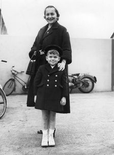 Olivia de Havilland with her four year old son, Benjamin Goodrich, London Airport, 1954
