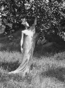 Olson, Margaret, Miss, standing outdoors, 1924 July. Creator: Arnold Genthe