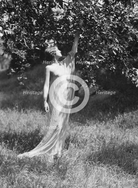 Olson, Margaret, Miss, standing outdoors, 1924 July. Creator: Arnold Genthe.