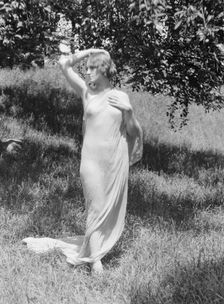 Olson, Margaret, Miss, standing outdoors, 1924 July. Creator: Arnold Genthe