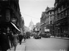 Open-topped omnibuses in Fleet Street, London