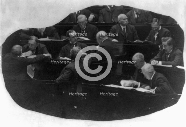 Opening of the 60th Congress - view of group of Congressmen at their desks, reading..., c1907 - 1909 Creator: Unknown.