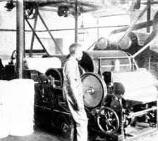 Opening, or loosening, the cotton: removing impurities by scutching..., 1909. Creator: Unknown