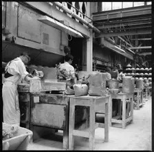 Operating jiggers in a pottery works, Stoke-on-Trent, 1965-1968. Creator: Eileen Deste