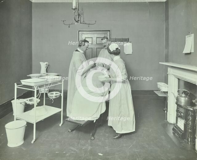 Operation Room, Woolwich School Treatment Centre, London, 1914. Artist: Unknown.