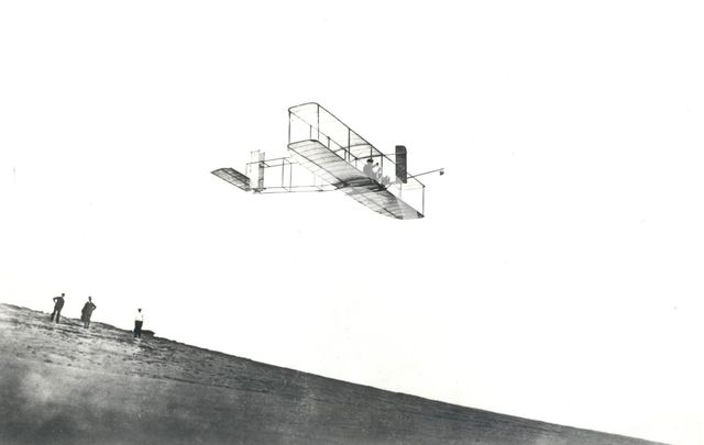 Orville Wright tests his glider at Kitty Hawk, North Carolina, USA, 1911. Creator: NASA.