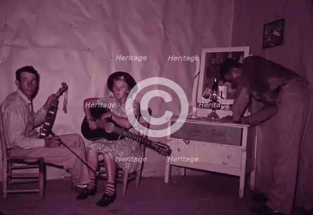 Orchestra during intermission at square dance, McIntosh County, Oklahoma, 1939 or 1940. Creator: Russell Lee.