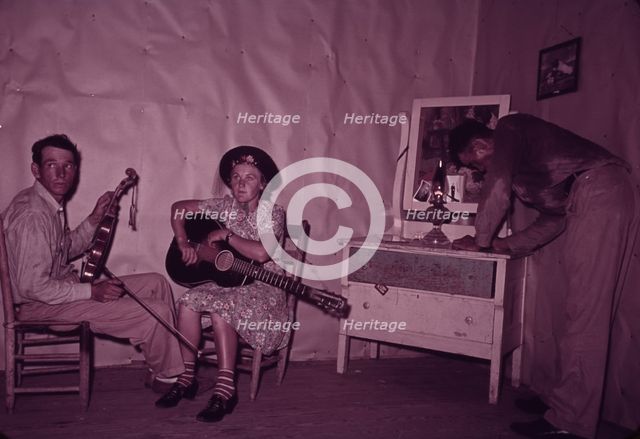 Orchestra during intermission at square dance, McIntosh County, Oklahoma, 1939 or 1940. Creator: Russell Lee.