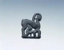 Ordos bronze plaque of she-goat and suckling kid, Eastern Zhou dynasty, China, 4th century BC. Creator: Unknown