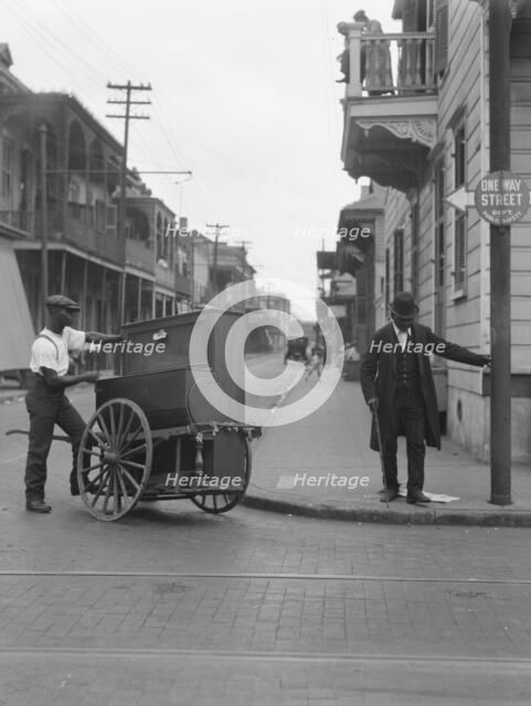 Organ grinder, New Orleans, between 1920 and 1926. Creator: Arnold Genthe.