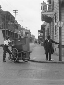 Organ grinder, New Orleans, between 1920 and 1926. Creator: Arnold Genthe