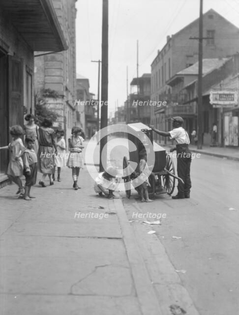 Organ grinder, New Orleans, between 1920 and 1926. Creator: Arnold Genthe.