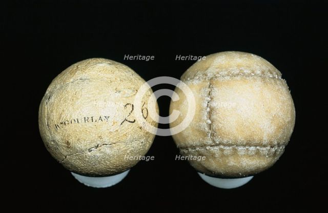 Original and reproduction of feathery golf balls, original c1830-c1840. Artist: William Gourlay