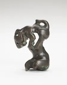 Ornament in the form of a feline-like animal on a foot-shaped stand, Han dynasty, 206 BCE-220 CE. Creator: Unknown