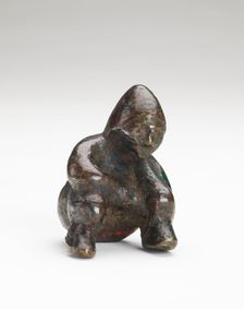 Ornament in the form of a seated person, Possibly Han dynasty, 206 BCE-220 CE. Creator: Unknown