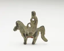 Ornament in the form of possibly a monkey riding a horse, Period of Division, 220-589. Creator: Unknown