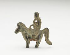 Ornament in the form of possibly a monkey riding a horse, Period of Division, 220-589. Creator: Unknown