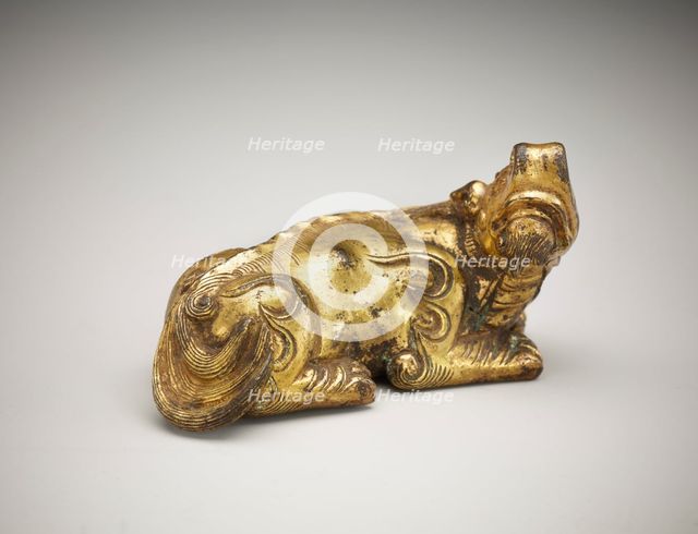 Ornament or weight: a recumbent ch'i-lin, Qing dynasty, 18th century. Creator: Unknown.