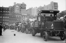Orphans going to Coney Island in Autos, 1911. Creator: Bain News Service
