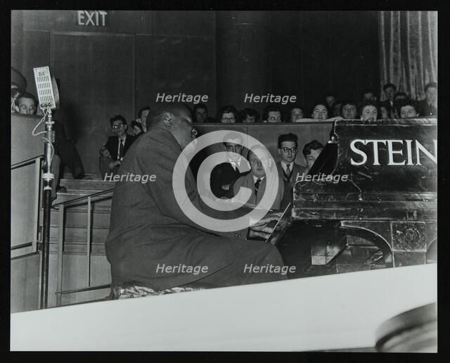 Oscar Peterson in concert at Colston Hall, Bristol, 1955. Artist: Denis Williams