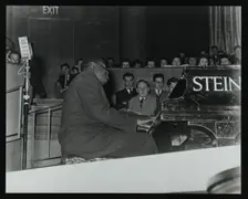 Oscar Peterson in concert at Colston Hall, Bristol, 1955. Creator: Denis Williams