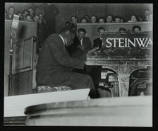 Oscar Peterson in concert at Colston Hall, Bristol, 1955. Creator: Denis Williams