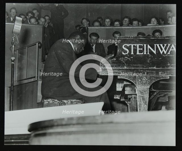 Oscar Peterson in concert at Colston Hall, Bristol, 1955. Creator: Denis Williams.