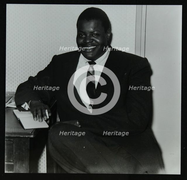 Oscar Peterson in the green room at Colston Hall, Bristol, 1955. Creator: Denis Williams.