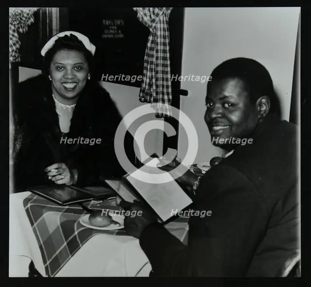 Oscar Peterson looking forward to dinner after a concert at Colston Hall, Bristol, 1955. Creator: Denis Williams.