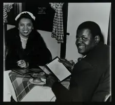 Oscar Peterson looking forward to dinner after a concert at Colston Hall, Bristol, 1955. Creator: Denis Williams