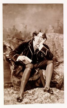 Oscar Wilde, Irish born wit and playwright, 1882. Creator: Unknown
