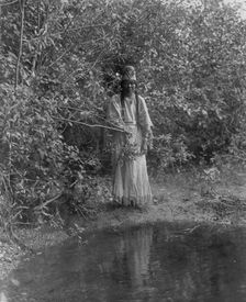 Out of the forests depths stepped an Indian maiden, c1905. Creator: Edward Sheriff Curtis
