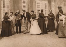 Outdoor gathering of people talking 1937. Artist: Louis Guichard