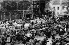Outside the Central Market, Paris, 1931.Artist: Ernest Flammarion