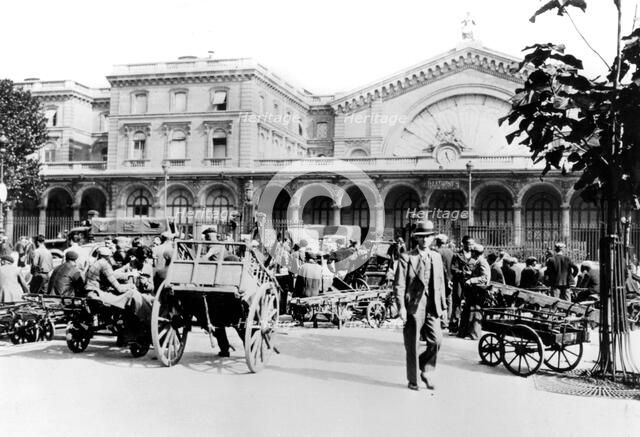 Outside the Gare de l'Est, German-occupied Paris, September 1940. Artist: Unknown