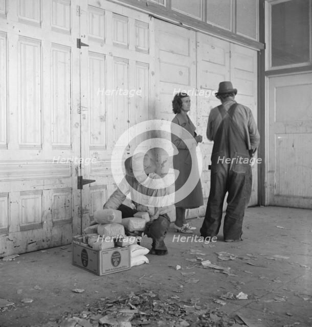 Outside the FSA grant office during pea harvest, Calipatria, California, 1939. Creator: Dorothea Lange.
