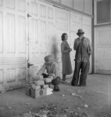 Outside the FSA grant office during pea harvest, Calipatria, California, 1939. Creator: Dorothea Lange
