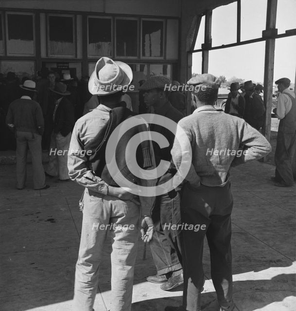 Outside the FSA grant office during the pea harvest, Calipatria, California, 1939. Creator: Dorothea Lange.