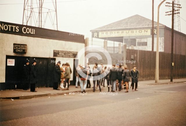 Outside the Notts County football ground, Meadow Lane, Nottingham, Nottinghamshire, 1968. Artist: George L Roberts